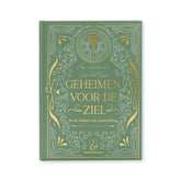 Groen boek met gouden accenten voor innerlijke rust in Geheimen voor de ziel